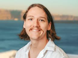 Nicholas Ernest (B.S. '26) left Richmond for Athens, but he didn't just  pack a suitcase—he brought his ambition. In a city that has seen empires  rise and fall, this VCU junior is