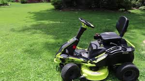 Even towing accessories takes little out of the battery. Ryobi Electric Riding Lawnmower Update Youtube