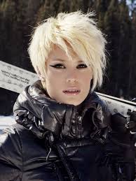 Create a middle part for your bangs and pin all your hair into a big bun on top of your head. Skater Haircut Girl Bpatello