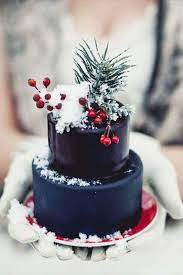A simple, yet stylish design of a christmas wreath on a cake. Christmas Wedding Cakes Arabia Weddings