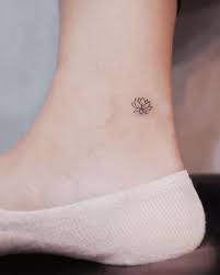 Small Minimal Lotus Flower Tattoo On The Ankle Www Otziapp Com Elegant Tattoos Subtle Tattoos Minimalist Tattoo Meaning