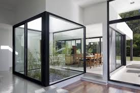 Small Bamboo Plants Garden In The Middle Simple Modern House Design With Black And White Interior Color Decoratin Patio Interior Tiny House Design House Design