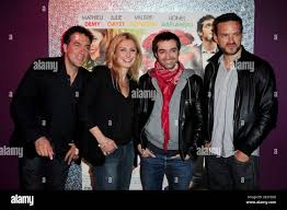 Guy Mazarguil, Julie Gayet, Mathieu Demy and Alban Lenoir attending the  premiere of 'l'Art de Seduire' held at the Gaumont Opera Le Francais in  Paris, France