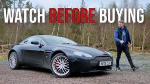 Image result for Titanium Silver 2011 Aston Martin