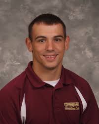 Coach Malave receives honor as wrestling program grows