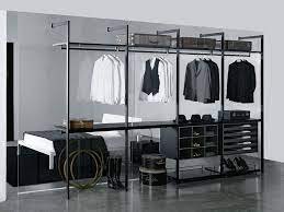 A vast, multifaceted ecosystem of wardrobes, islands, chests of drawers and day or night containers, customisable to the last centimetre. Porro Spa Products Systems Cabina Armadio Walk In Closet