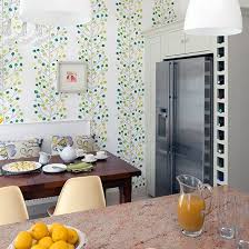 kitchen diner with green wallpaper