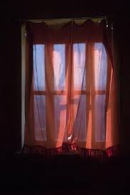 Light rays shining through window in jail. Photographic Print Sunlight Shines Through A Window Diffused By A Red Curtain By Steve Winter 24x16in Window Photography Window Aesthetic Aesthetic Window