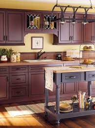 The soft and creamy pastel has a hint of orange, which blends beautifully with all types of natural wood, no matter the undertone, including yellow and red. Kitchen Cabinet Wood Choices Yellow Kitchen Walls Home Kitchens Kitchen Design