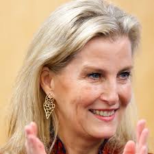 Kate Middleton wears sophisticated red Alexander McQueen coat as she steps  out with Prince William to launch Hold Still community exhibition