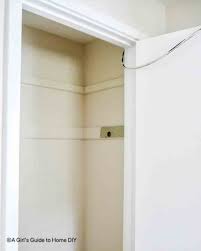 Attach the rod by inserting it into its brackets. How To Install A Closet Rod A Girl S Guide To Home Diy