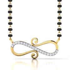 The 22k gold mangalsutra in the collection are in daintiest designs and symbolise eternal love, faith, and respect that a married couple shares. Latest Diamond Mangalsutra Designs Online In India