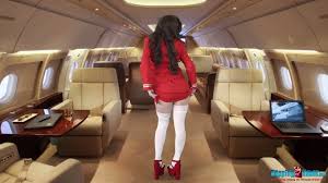 Filthy stewardess in sexy uniform gets naked on the plane