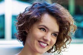 A deep part with one side tucked behind the ear is the perfect way to style soft curls. 30 Popular And Trendy Curly Hairstyles For Teenage Girls Haircuts Hairstyles 2021