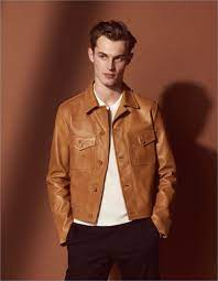 Kit Butler Dons A Brown Leather Jacket From Sandro S Mr Porter Summer Capsule Collection Leather Jacket Men Style Leather Jacket Men Stylish Leather Jacket