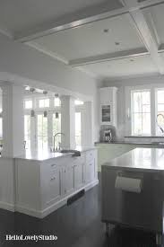 Designed by karen swanson, owner of new england design works in manchester, ma and pennville custom cabinetry, this modern farmhouse kitchen is this farmhouse kitchen features perimeter inset cabinets painted in an ivory white and gray island with a combination of stone and butcher block. 9 Modern Farmhouse Interior Design Ideas Hello Lovely