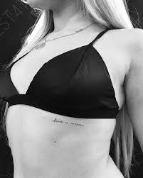 This tattoo is about much more than just dots and dashes, it is a sophisticated and stylish way to say 'i love you' without words at all. Love You More Tattoo Behind The Left Breast