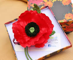 Less than unit(s) sort by: New Silk Poppy Presentperfect Creations Original Hand Crafted Flower Accessories In Fine Fabrics And Genuine Leather