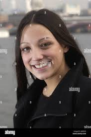 Erin Rocha, 16-year-old A Level student, from Poole in Dorset, poses for  photographers outside the London TV Centre