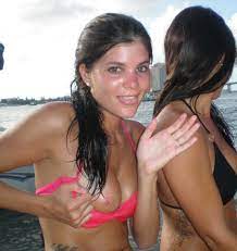 Girl wet in a bikini flashing her tit. Porn Pic - EPORNER