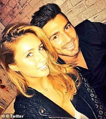 Danielle Fogarty hits the beach with husband Ross Warwick and son Mason, 14  months