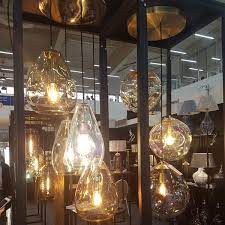 These foyer pendant light fixtures have brass frames, stylized in antique and the window is imitation of candles. Group Of 3 Coloured Glass Pendant Lights Blob Shaped Casa Lumi