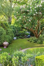 Curator And Potter Joanna Bird Has Turned Her Garden Into An Lush Exhibition Space Bird Curator Exhibi Small Garden Design Small Gardens Beautiful Gardens