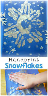 Snowflake Handprints In The Playroom Winter Crafts For Toddlers Winter Crafts For Kids Winter Diy Crafts