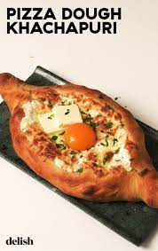 Pizza Dough Khachapuri Is The Creamiest Cheesiest Bread Ever Recipe Cheesy Bread Pizza Dough Pizza