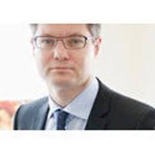 Next pares back hopes for 2012