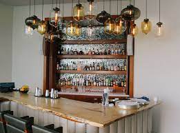 These Custom Bar Lights Give The Bar At The Rosewood Hotel Abu Dhabi A Special Feel Lighting Can Create Nearly Any Rosewood Hotel Bar Design Circular Lighting