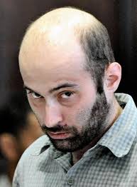 NYC man held in 8-year-old boy's slaying says he hears voices