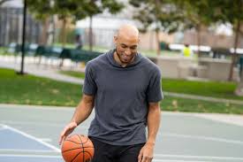 Explore his basketball background.