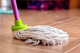 Mix a solution of 2 cups vinegar per gallon of hot water, dip a cloth in the solution, wring it well and rub along the planks in one direction only, not back and forth. 4 Tips And Tricks On How To Get Wax Off Hardwood Floors Mind Tweaks