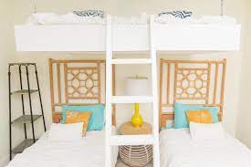 Guest bedroom with hanging bed, after. Bold Modern Beach House Guest Bedroom Beach Flip Hgtv