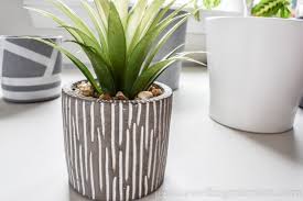 Plants may appear wilted and thirsty, but take care to refrain most potting soil contains fertilizer. Diy Modern Indoor Plant Pots With Paint Pens Ideas For The Home