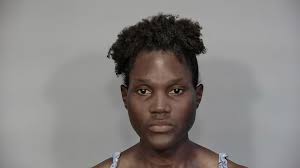 Woman accused of biting cop