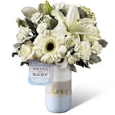 Many of the newborn baby flower arrangements we offer come in beautiful designer and keepsake vases. Ftd Sweet Baby Boy Bouquet By Hallmark Toronto Flowers
