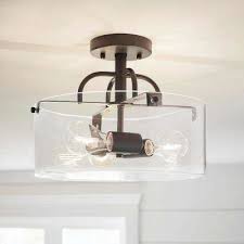 Warehouse of tiffany gunslid rl8183ch flush mount light. 3 Light Bronze Semi Flush Mount With Clear Glass Shade Semi Flush Mount Lighting Glass Shades Industrial Flush Mount Lighting