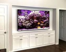 Before And After How To Update Your Deep Cabinetry To House A Big Flat Screen Tv Designed Big Tv Wall Tv Wall Design Living Room Tv Wall