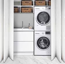 Small laundry nook concealed in large closet. 5 Ideas For A Small Laundry Spaces Bath Co
