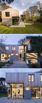 The First Floor Of This Modern House Is Clad In Cedar And Large Windows Fill The Interior Of The Ho Modern Family House Architecture Modern Architecture House