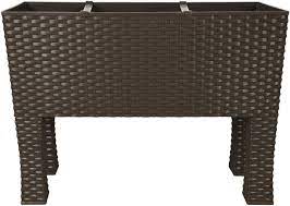 Placing a few of these in a corner of a this planter is made from rattan, and plants cannot be repotted into this airy planter. Crazygadget Large Rattan Long Rectangular 30l Tall Planter Case Box Plastic Garden Indoor Outdoor Flower Plant Bed Pot With Legs And Watering System Brown Amazon De Garten