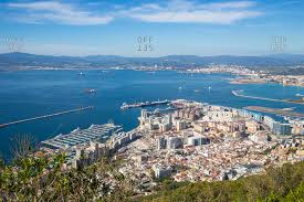 Gibraltar, british overseas territory occupying a narrow peninsula of spain's southern mediterranean coast, northeast of the strait of gibraltar. Gibraltar City Stock Photos Offset