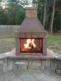 A chimenea's design draws fresh air into the fire by moving the smoke and soot of a fire away from those present. Open Outdoor Fireplace Kit That Are Easy To Assemble By Mirage Stone