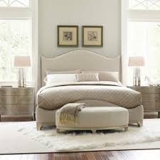It includes two nightstands and one bed, all made from a blend of solid and engineered wood in a neutral hue. Caracolecaracole Compositions Avondale California King Upholstered Bedroom Set Dailymail