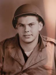 Private Robert Maye leaning down from a window, with the help of Harvey  Wilson (left) and Frank Harvey (right), to kiss Gloria, his wife, goodbye  before leaving for the Korean War in