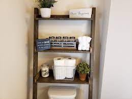 The monarch specialties ladder desk with storage has not one, but two sizeable shelves for larger items, making it ideal as a computer desk with tower storage on the bottom shelf. How To Build A Leaning Bathroom Ladder Shelf Diy Floating Ladder Shelf Ryobi Nation Projects