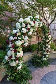 Garden gate has a unique approach to seasonality. Ceremony Moon Arch With Lush Burgundy And White Flowers Ceremony Arch Texas Wedding Planner Burgundy And Blush Wedding