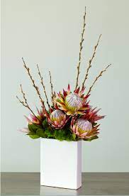 Modern King Protea Centerpiece Www Tablescapesbydesign Com Https Www Fac Flower Arrangement Designs Tropical Flower Arrangements Tropical Floral Arrangements